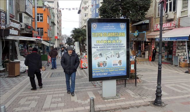Dolandırıcılara karşı afişli uyarı