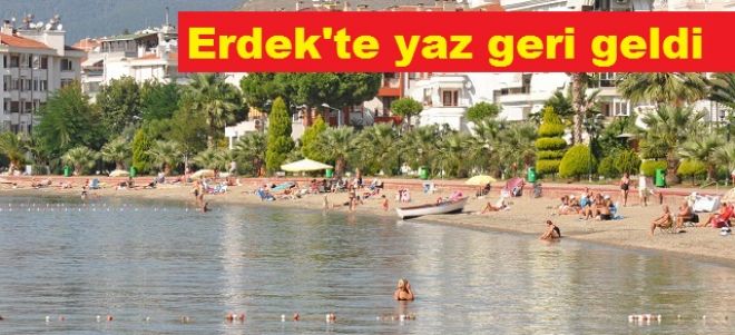 Havlusunu alan denize koştu